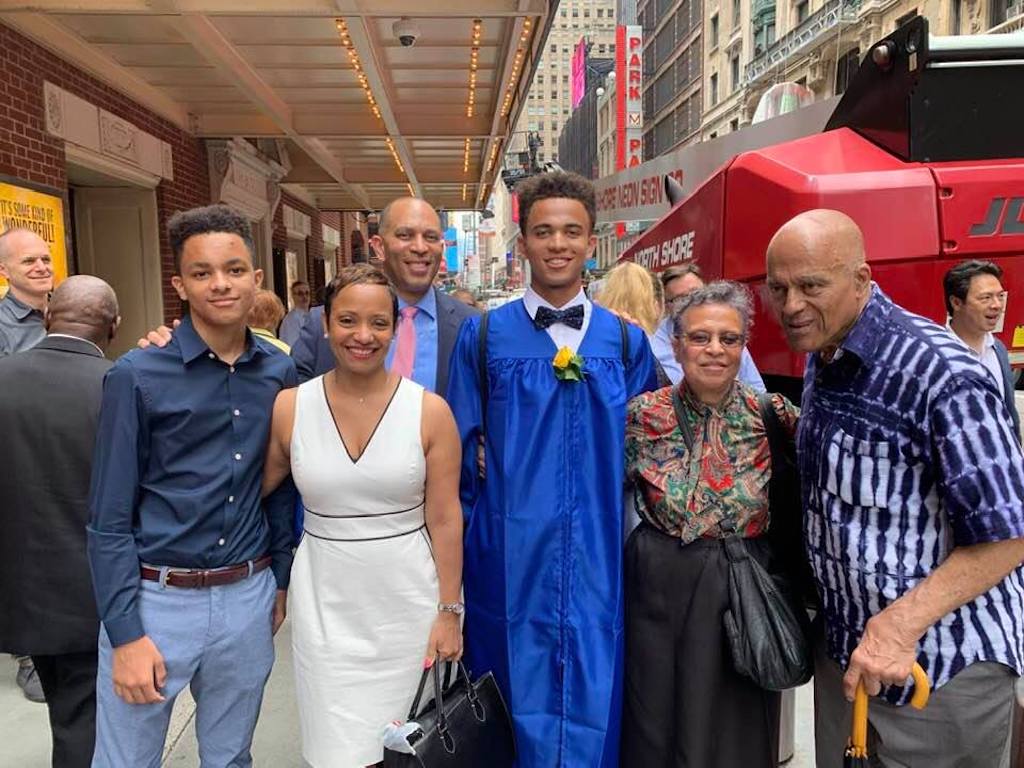 Hakeem and Kennisandra Jeffries with their family celebrating their son, Jeremiah's high school graduation